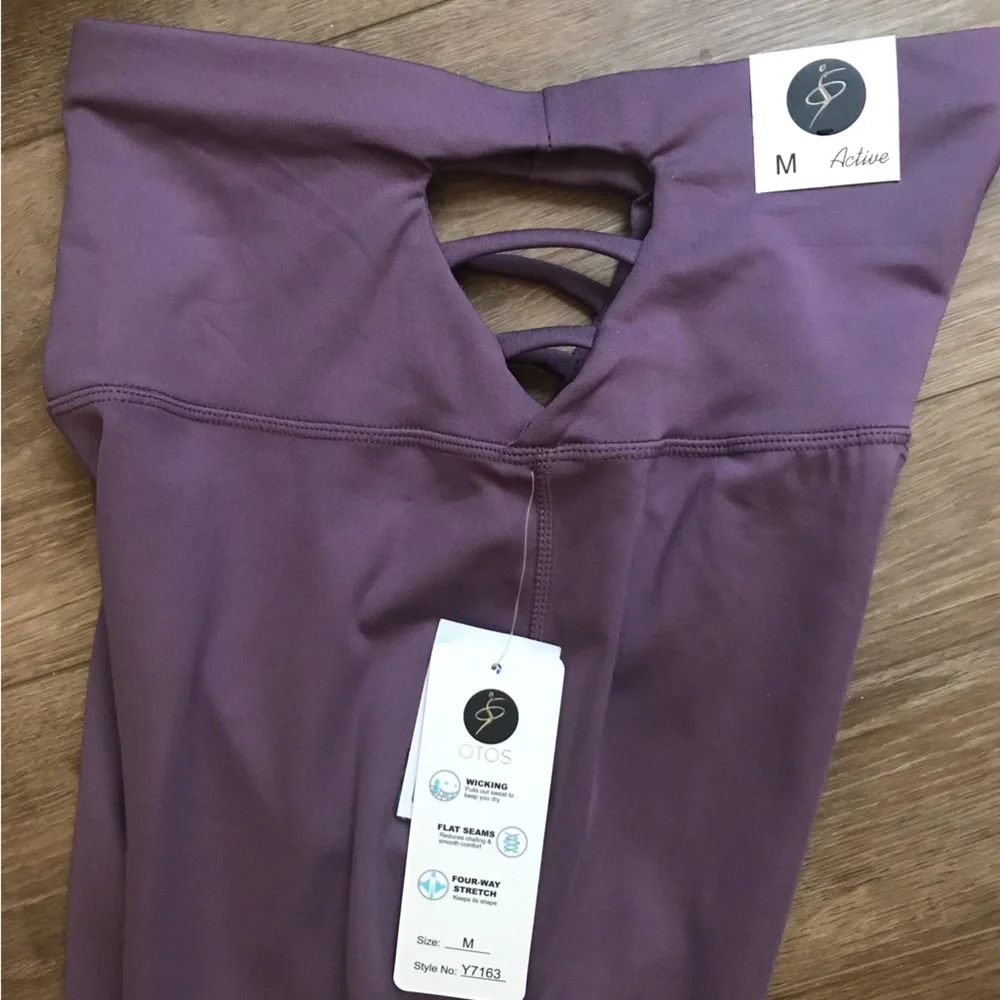 Otos Active Wear yoga pants. Flare leg at bottom. Sides are cut out.💜 - Picture 1 of 4